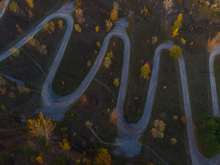 Image showing Aerial top vew of winding road in the city