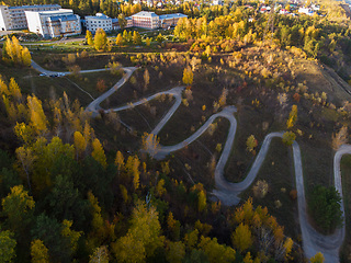 Image showing Aerial top vew of winding road in the city