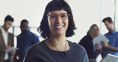 Image showing Leadership, portrait and business woman in the office with confidence after planning a project. Happy, smile and professional female corporate employee standing in workplace after working with team.