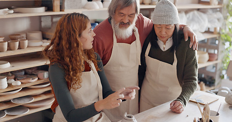 Image showing Art teacher, pottery and senior couple in a class, learning tips in art class. Young woman teaching old man and old woman to roll clay, sculpture and giving instruction in studio to learn new skill