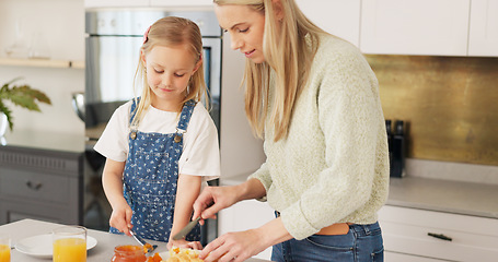 Image showing Breakfast, morning and mother and kid cooking, help or prepare croissant meal, fruit or food in home kitchen. Love, happy family and youth girl with mom, mama or woman enjoy fun quality time and bond