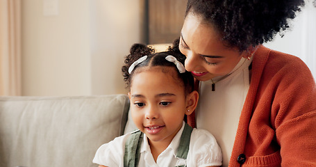 Image showing Happy, mother and child with hug, kiss and love for playful relationship bonding on living room sofa at home. Mama and kid playing together in happiness for loving care or joy relaxing on the couch