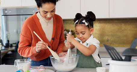 Image showing Family, cooking and child learning baking fun skills development activity and bonding in kitchen at home. Happy mother, kid smile and mom teaching to bake cake recipe, support and trust relationship