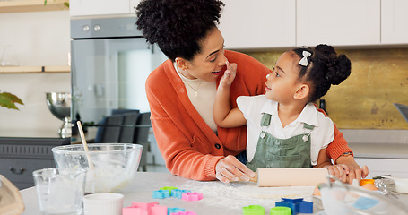 Image showing Cooking, learning and mother and girl in kitchen for food, health and breakfast at morning. Help, wellness and happy with mom and child at table in family home for baking, cake and dessert lifestyle