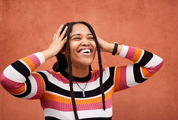 Image showing Wall, black woman and thinking with joy, laughing and freedom with happiness, future and imagination. Jamaican, happy female and lady with smile, wonder and freedom on backdrop, trendy and fashion