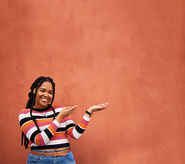 Image showing Mockup, portrait or happy black woman with marketing, product placement or branding space on wall background. African gen z girl advertising discount deal news, sales offer or promotion announcement