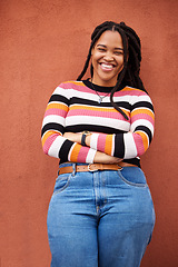 Image showing Portrait, proud and black woman on mockup in studio, happy, relax and smile on orange background. Face, confident and girl in positive, mindset and good mood on wall, advertising or product placement