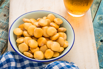 Image showing Tasty lupins and glass of beer