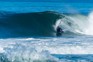 Image showing Bodyboarder surfing ocean wave