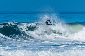 Image showing Bodyboarder surfing ocean wave