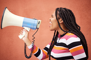 Image showing Megaphone, protest or angry black woman with speech announcement for politics, equality or human rights. Young feminist leader, stop or loud gen z girl shouting for justice or help on wall background