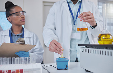 Image showing Science, laboratory and team with liquid in test tube for medical research, study and vaccine development. Biotechnology, pharmaceutical and scientists with sample for analysis, test and experiment