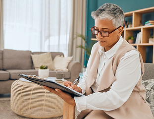 Image showing Planning, notes and mature woman in therapy with a strategy, plan and reading a case. Psychology, analysis and psychologist with paperwork after counseling to check for mental health problem