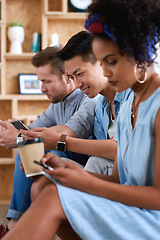 Image showing Diversity, people and smartphones with connection, typing and chatting for social media, happiness and cheerful. Multiracial, happy group and staff with devices, online reading and communication