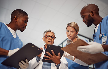 Image showing Tablet, teamwork and group of doctors in hospital management, results and medical data with manager. Nurse, professional healthcare people and technology of clinic review, planning or problem solving