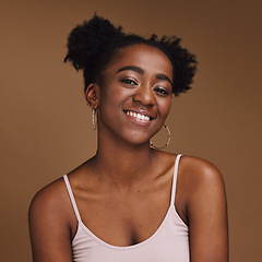 Image showing Black woman, smile and student portrait of a gen z person with makeup and jewelry in a studio. Isolated, brown background and happiness of a young female with skincare glow, cosmetics and face