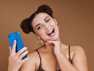 Image showing Selfie, happiness and woman with a phone feeling excited, happy and beauty for profile picture. Social media, isolated and studio background with mock up of gen z, young and face of a young person