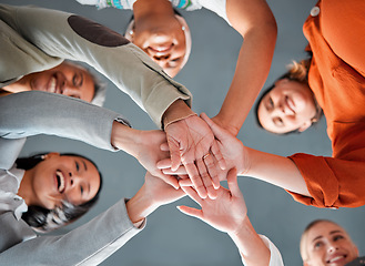 Image showing Team building, hands together and diversity of women in office feeling community, support and success. Happiness, collaboration and teamwork of happy people below with work cooperation and motivation