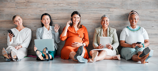 Image showing Creative business people, portrait smile and networking sitting together on floor at office. Happy group of employee women smiling with technology in team hiring, welcome or management for startup