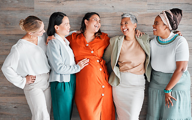 Image showing Pregnant woman, team and smile for touch, stomach and excited with support, solidarity and care. Group, women and pregnancy in office with love, community diversity and happy at financial workplace