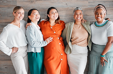 Image showing Happy, friends and portrait of a pregnant female with women by a wood wall at her baby shower. Friendship, diversity and group of ladies supporting, loving and bonding with pregnancy together.