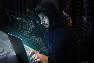 Image showing Cyber security, coding and hacker in server room with hologram, laptop in data center and stealing sensitive digital information. Technology, software and man hacking in database to update ransomware