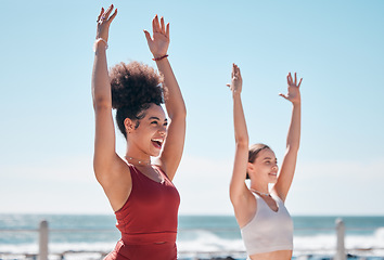 Image showing Yoga, chakra and beach with woman friends outdoor together in nature for wellness training. Exercise, fitness or zen with a female yogi and friend outside for a mental health workout by the ocean