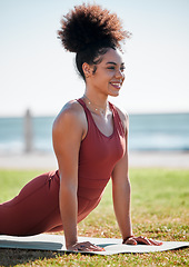 Image showing Yoga, pilates and black woman stretching on grass for healthy lifestyle, body wellness and cardio workout. Sports, fitness and girl doing meditation training, cobra stretch and exercise for peace