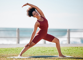 Image showing Fitness, stretching and black woman for yoga on grass for healthy lifestyle, body wellness and cardio workout. Sports, pilates and girl doing meditation, training and exercise for zen, peace and calm