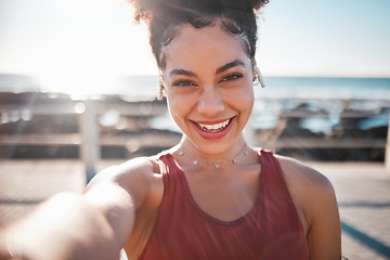Image showing Fitness, black woman and portrait smile for selfie, vlog or profile picture by beach for running exercise. Happy African American female runner smiling for social media, memory or post by ocean coast