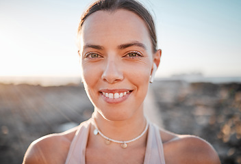 Image showing Portrait, fitness and music with a sports woman outdoor, standing against a mockup sky background. Face, exercise and wellness with a female athlete cardio or endurance training alone outside