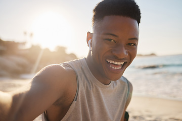 Image showing Selfie, beach and fitness with a sports black man outdoor during summer for a cardio or endurance workout. Portrait, nature and exercise with a male runner or athlete training outside for health