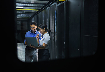 Image showing Server room, technician people and laptop for software management, system upgrade or cyber security. Teamwork, data center and engineer or programmer employees, information technology and programming