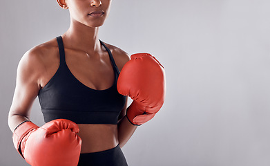 Image showing Boxing, gloves and woman on background, mockup and space for sports exercise, strong warrior and mma training. Female boxer, workout and fist fight in studio, energy and power in challenge of mock up