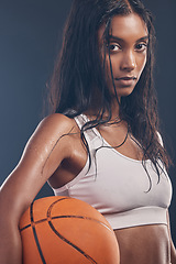 Image showing Basketball player portrait, sports workout and woman for studio challenge, practice game or fitness competition. Performance training, health exercise and athlete model isolated on dark background