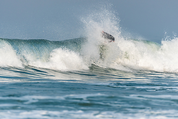 Image showing Bodyboarder surfing ocean wave