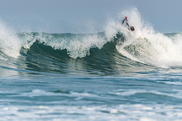 Image showing Bodyboarder surfing ocean wave