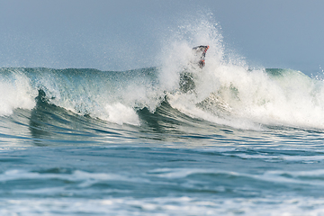 Image showing Bodyboarder surfing ocean wave