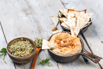 Image showing Bowl of homemade hummus