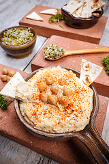 Image showing Hummus seasoned with paprika