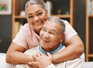 Image showing Love, senior couple and hug in living room home, bonding caring and smiling. Valentines day, romance and portrait of man and woman hugging, embrace and cuddle for support while enjoying time together