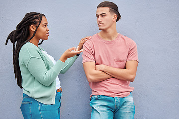 Image showing Young interracial couple, wall background and argument in city with black woman, question and conversation. Gen z man, partner and conflict in metro with relationship, fight and angry arms crossed