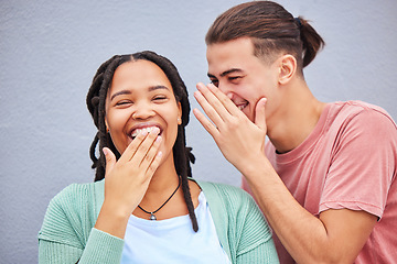 Image showing Laugh, secret and boyfriend whisper to his girlfriend a funny story, joke or information by a wall in city. Comic, happy and man talking in woman ear for gossip in town on a holiday or weekend trip.