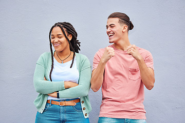 Image showing Happy, laughing and interracial couple being funny together isolated on a background. Comic, smile and dancing man with a black woman with arms crossed and pride after a fight on a wall backdrop