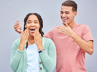 Image showing Love, surprise and couple with smile, celebration and romantic with happiness, bonding and grey studio background. Romantic, man and woman with joy, Valentines day or loving together, wow or backdrop