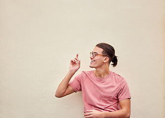 Image showing Happy man, glasses or pointing up on isolated background for advertising branding, optometry sales deal or mockup marketing. Model, student or showing hands gesture in fashion eyes vision or support