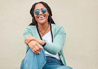 Image showing Black woman, sunglasses and city by wall for portrait, happy and smile with fashion in summer. Young gen z, african student girl and outdoor for travel, urban adventure and aesthetic with happiness