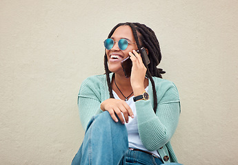 Image showing Black woman, phone call and sunglasses by wall in city, happy and smile with fashion in summer. Young gen z, african student girl or smartphone for travel, urban adventure or aesthetic with happiness