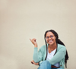 Image showing Black woman, portrait and hands pointing to mockup, advertising or empty background, laugh and excited. Hand gesture, face and girl relax in studio while showing wall copy space or isolated marketing