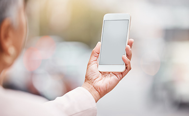 Image showing Businesswoman, hands and mockup phone in city for data management, gps app and review analytics news. Worker, smartphone mock up space and urban tech for networking, mobile research and media website